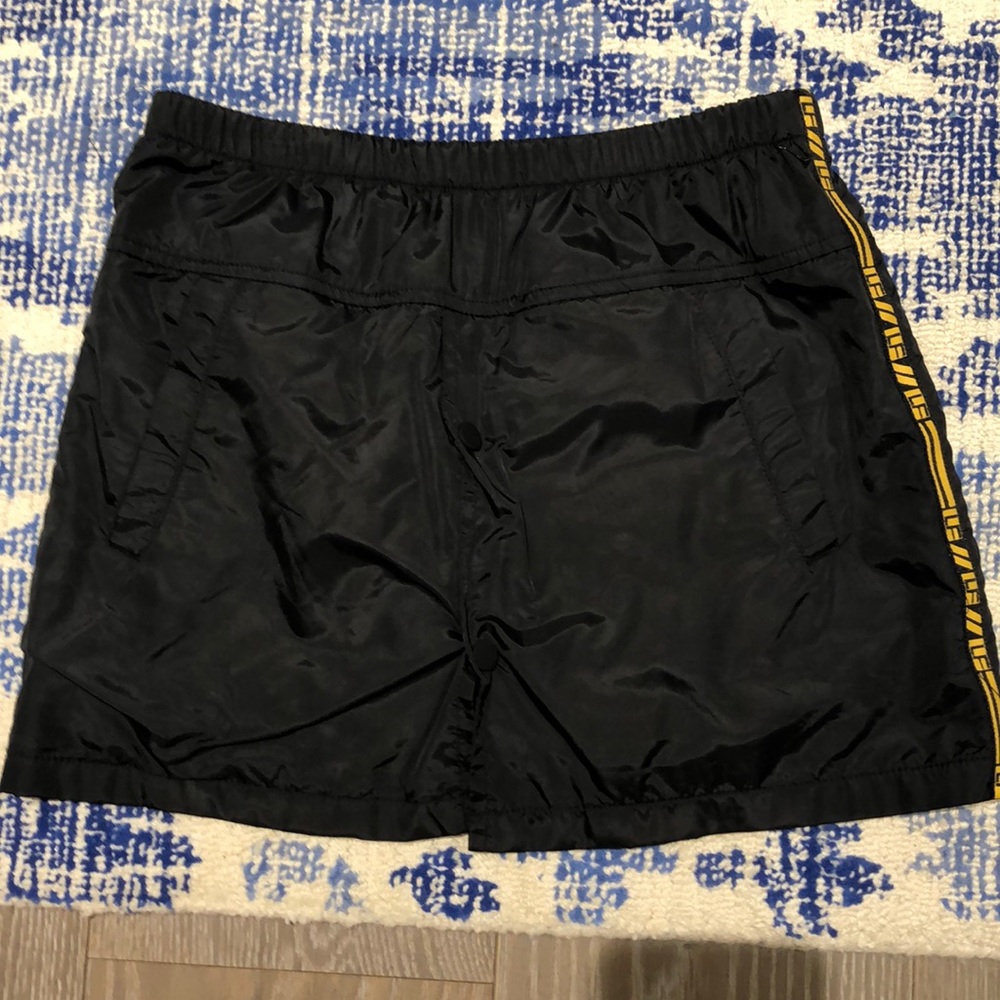 LF black with yellow strips mini skirt